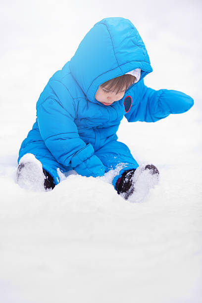 One year old in snow stock photo