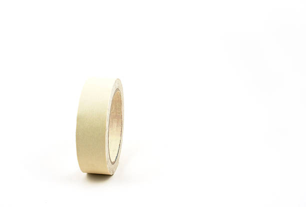 istock Standing round  yellow masking tape roll. 466412785