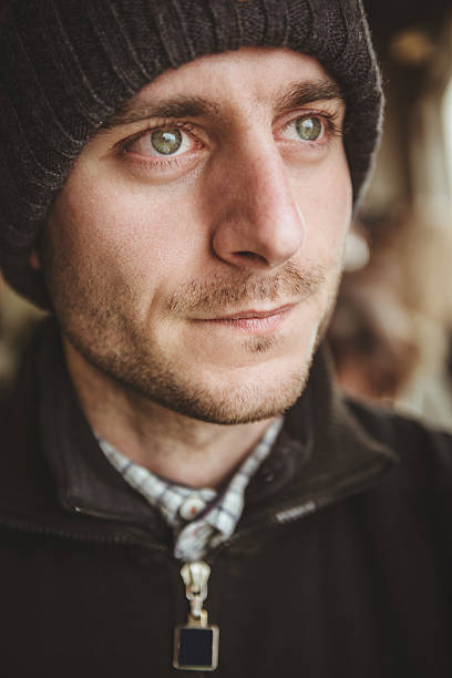 istock caucasian pensive man with knit hat portrait 466413399