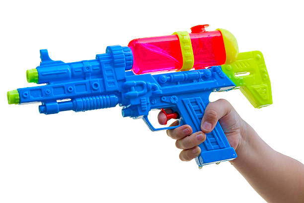 istock Child with a water pistol  on white 466414034