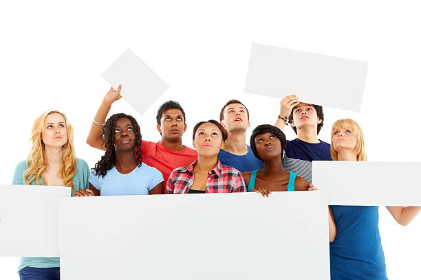 istock Diverse group of young students with billboards looking up 466419203
