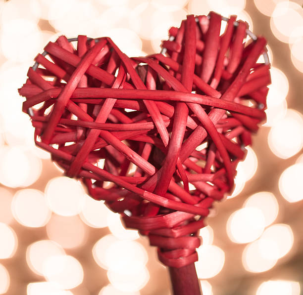 istock heart shape wood on defocus background 466420635