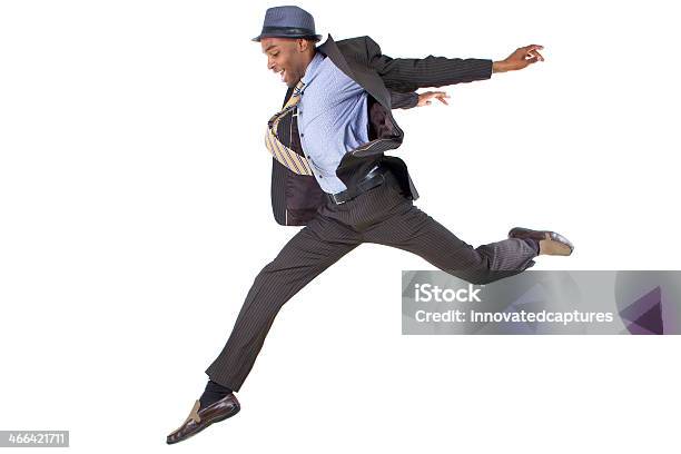 Man Leaping In Business Clothes On White Background Stock Photo - Download Image Now