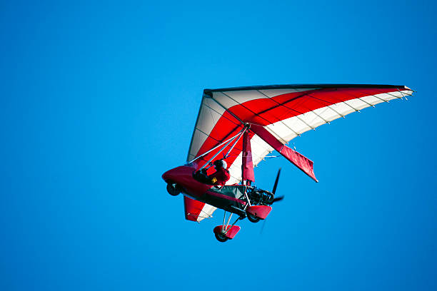 air педали в небе - airplane sky extreme sports men стоковые фото и изображения