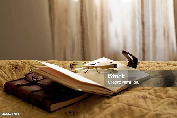 Two Books With Glasses Stock Photo - Download Image Now - Beige, Book, Bookshelf