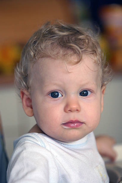 istock Baby boy with blue eyes 466422609
