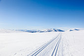 Nordic winter  with blue skies in the mountains.