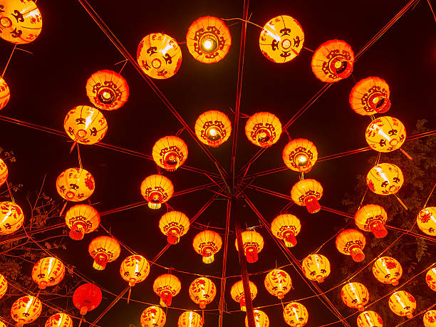 istock red lantern, China style, hanging on outdoor sky 466425294