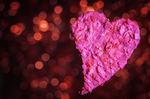 istock Valentines Day paper heart on abstract background 466427601