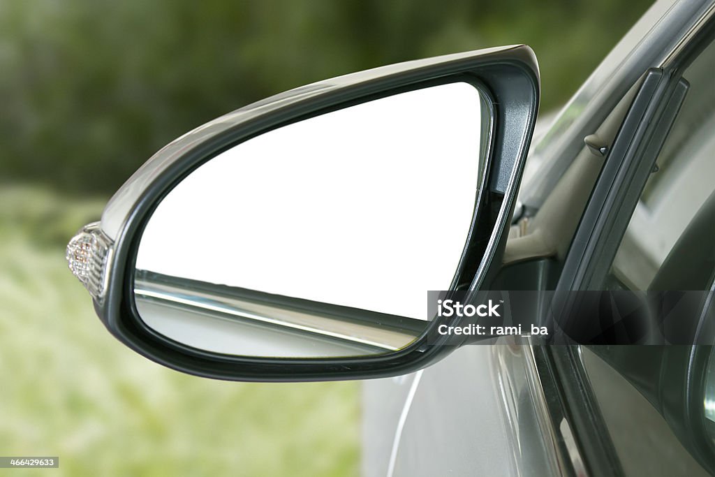 Car side mirror Car mirror on green background with empty space to add your image or graphics object inside the mirror Blank Stock Photo