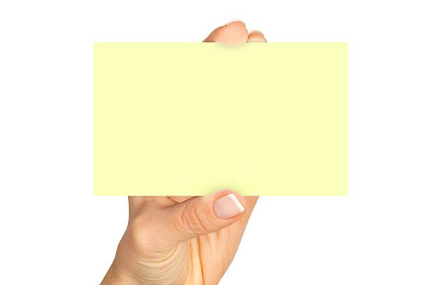 istock fingers holding a blank card 466429634