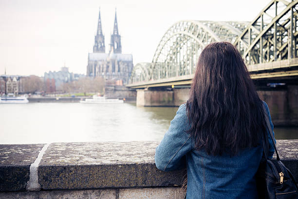 istock young woman in cologne 466430121