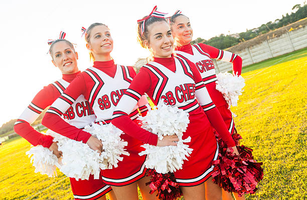 istock Group of Cheerleaders in the Field 466432117