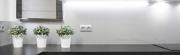 istock Flowerpots on the wooden worktop 466432850