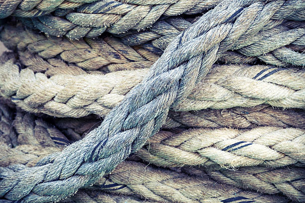 istock Nautical rope, closeup background texture, vintage toned 466433316
