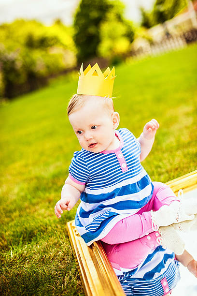 istock Cute baby girl outdoors with mirror 466434021