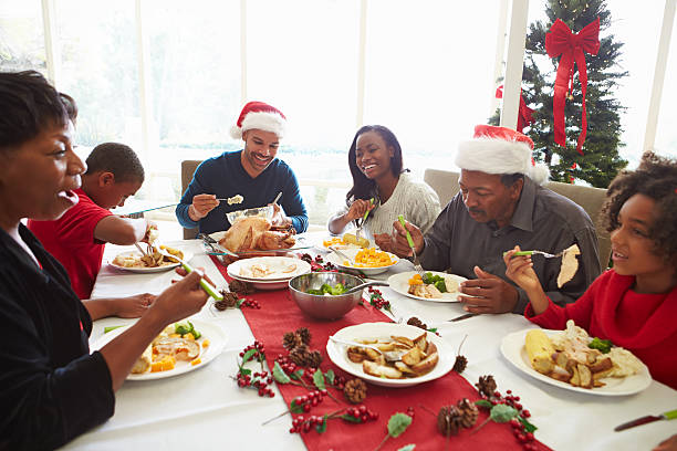 istock Family enjoying Christmas meal 466434049