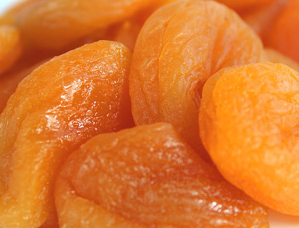 obraz/owoce suszone morele, stoned morela-połówki gotowe do spożycia - apricot portion antioxidant fruit zdjęcia i obrazy z banku zdjęć