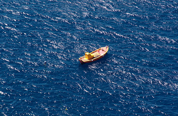 istock Small fisherman boat in Santorini island 466437344