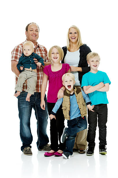 istock Front view of happy family standing together 466438224