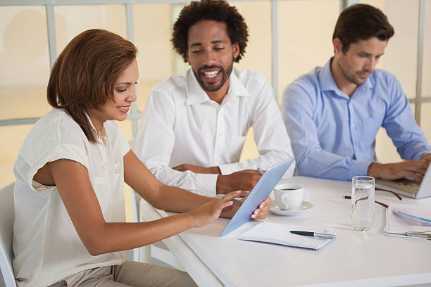 istock Business people using digital tablet in meeting 466438696