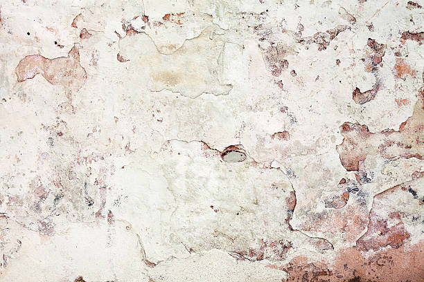 istock Old grunge wall with cracked stucco. Background texture 466439339