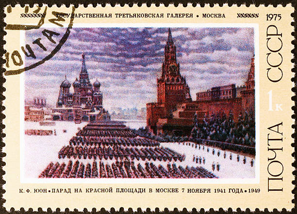 istock Military parade in Moscow on old russian stamp 466439617