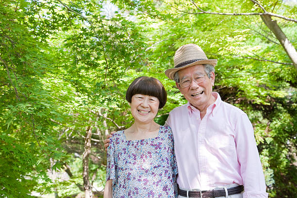 istock A smiling elderly couple in a wooded area 466441955