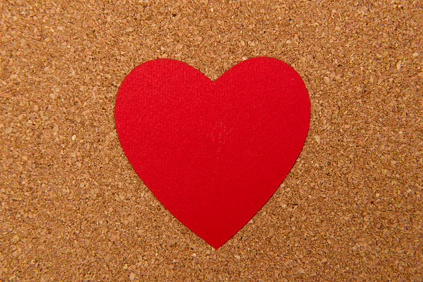 istock red heart on pressured cork background 466442651