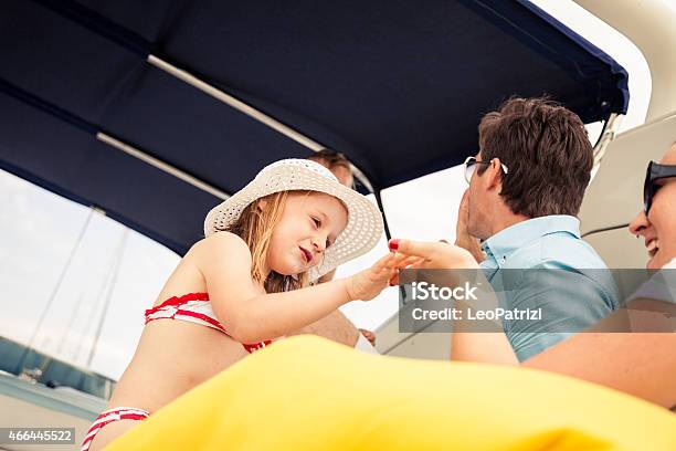 Happy Young Family And Sons Playing Together Stock Photo - Download Image Now - 2-3 Years, 2015, Adult