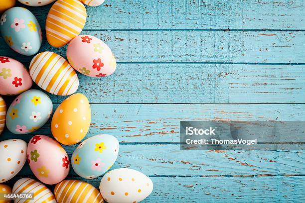 Easter Eggs On Old Blue Wood Season Background Frame Stock Photo - Download Image Now