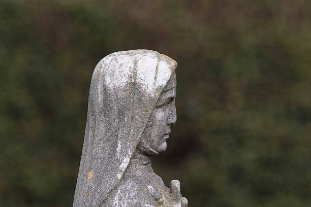 istock St. Therese of Lisieux stone statue 466445780