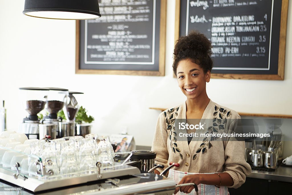 Female Owner In Coffee Shop Female Employee In Coffee Shop Smiling At Camera Owner Stock Photo