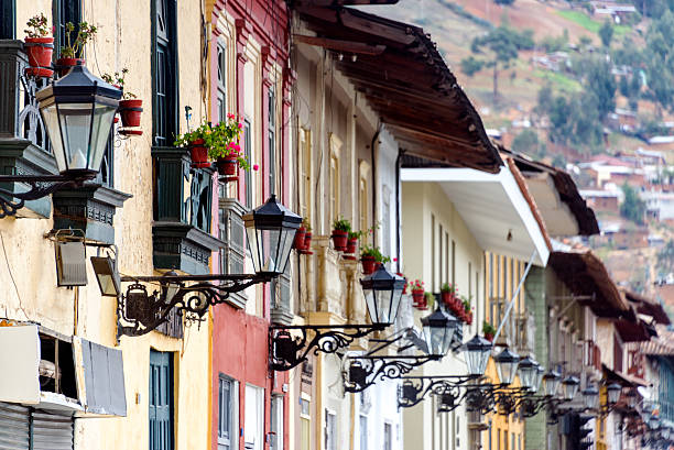 Streetlights in Cajamarca, Peru Colonial facades and rows of street lights in Cajamarca, Peru cajamarca region stock pictures, royalty-free photos & images