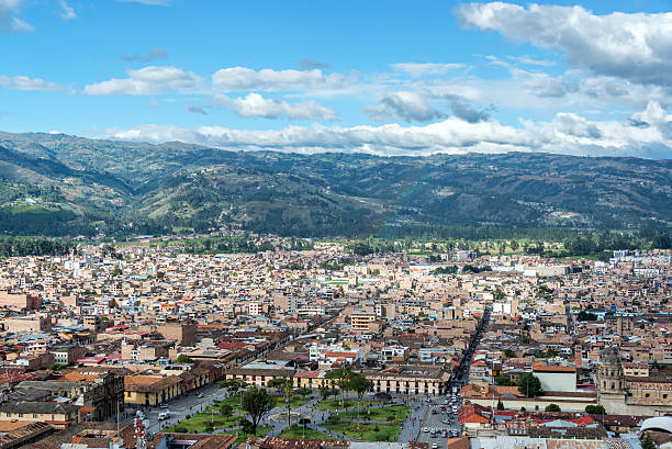 Cajamarca, Peru Cityscape Cityscape view of Cajamarca, Peru and the surrounding hills with the Plaza de Armas visible at the bottom cajamarca region stock pictures, royalty-free photos & images