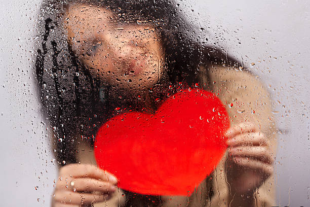 istock Woman with heart 466446893