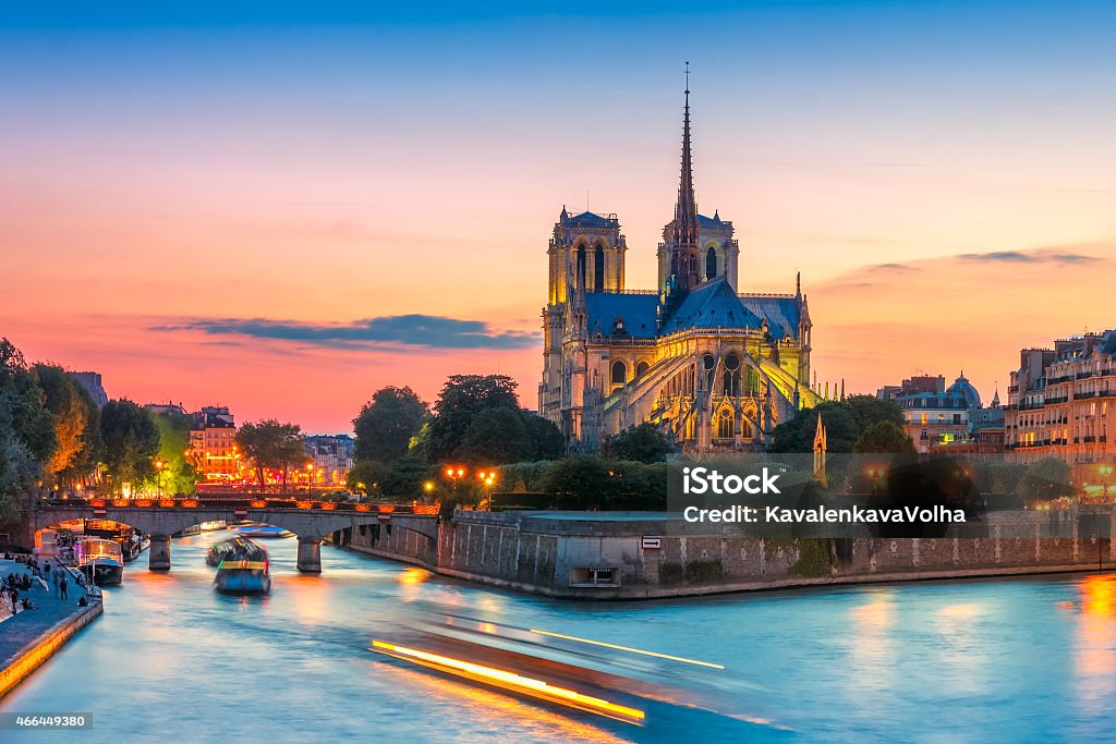 Cathedral of Notre Dame de Paris at sunset, France Picturesque cityscape of Cathedral of Notre Dame de Paris at sunset, France 2015 Stock Photo