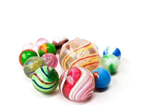 istock Vintage colorful glass marbles on white background. 466451361