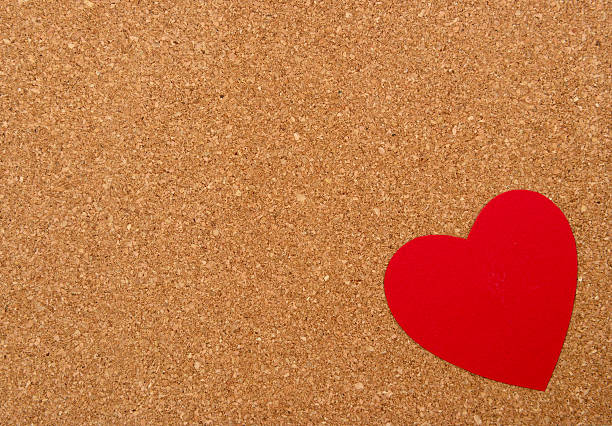 istock red heart on pressured cork background 466451603