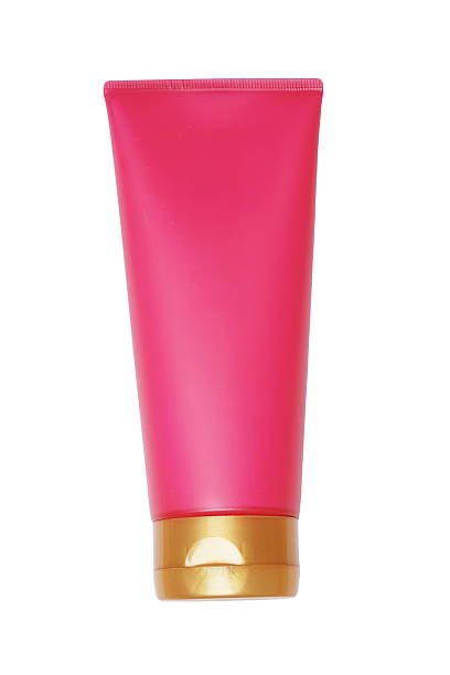 istock pink plastic tube with closed yellow  flip top lid 466452268