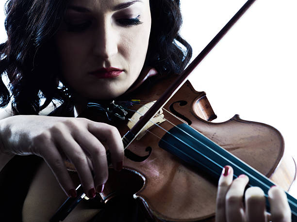 istock Violinist woman slihouette isolated 466452916
