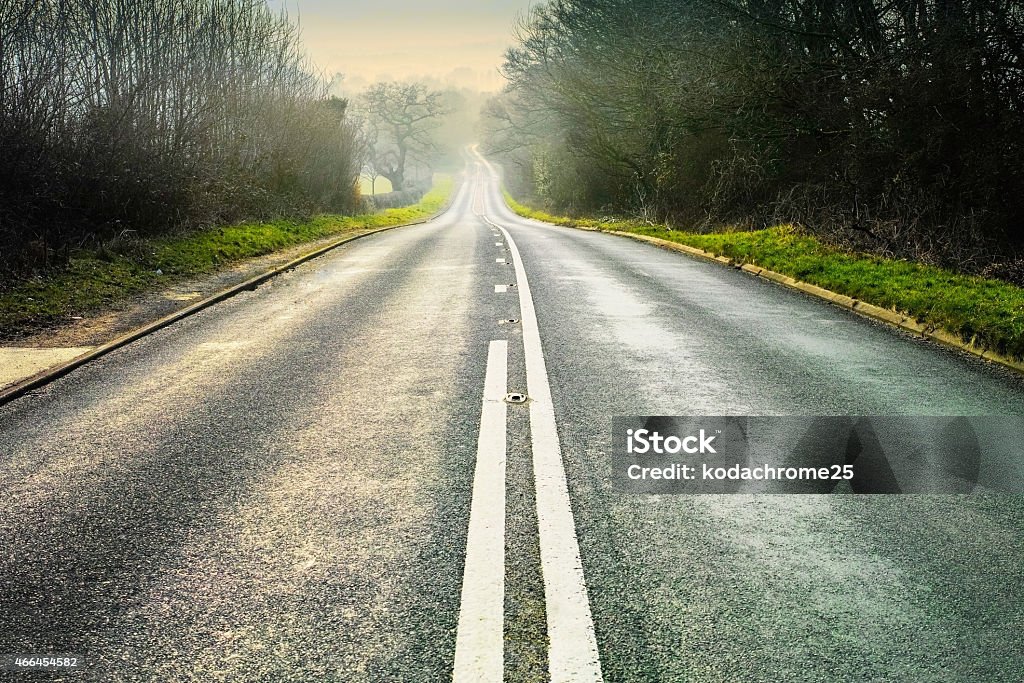 country lane a tarmac country lane or road in a rural environment in the countryside 2015 Stock Photo