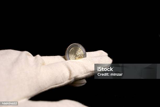 Coin Of Two Euro On Hand Stock Photo - Download Image Now - Two Euro Coin, 2015, Ahsha Rolle