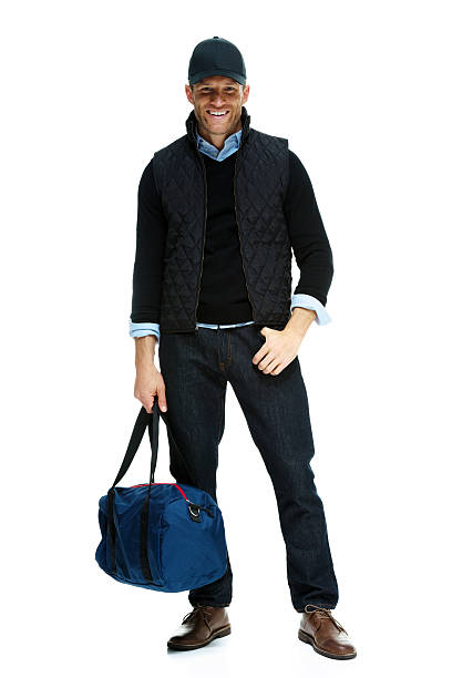istock Smiling casual man holding duffle bag 466458136