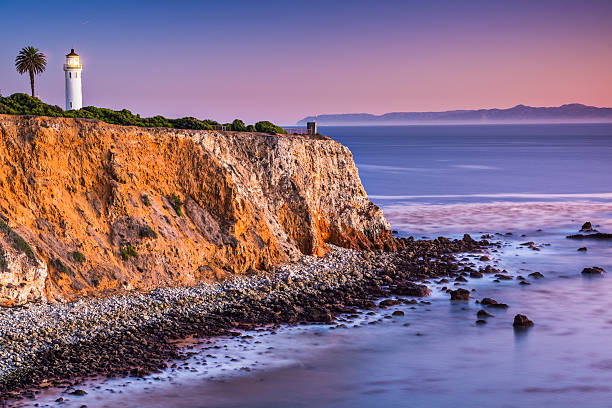 Pacific oceanfront cliff with lighthouse and palm tree Point Vicente in Rancho Palos Verdes, Los Angeles, California. rancho palos verdes stock pictures, royalty-free photos & images