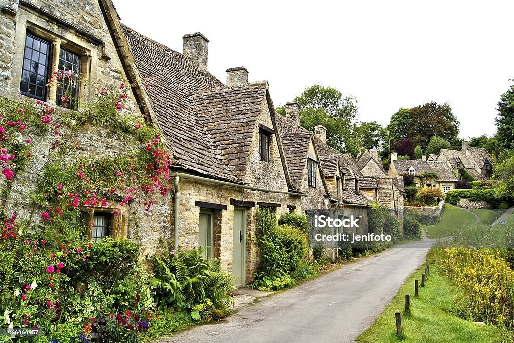 English town in the Cotswolds Houses of Arlington Row in the village of Bibury, England Cotswolds Stock Photo