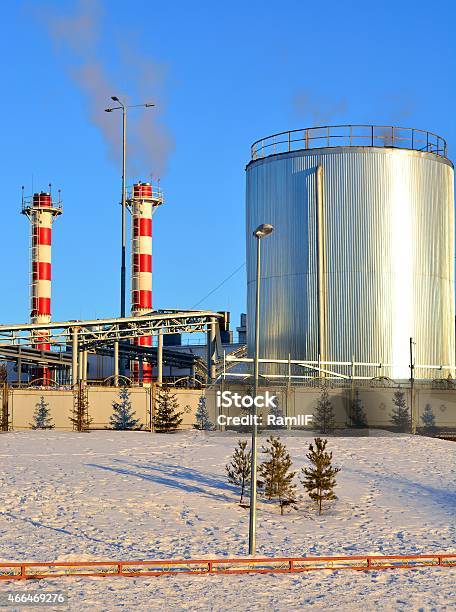 Boiler Tube Urban Winter Against The Blue Sky Stock Photo - Download Image Now - 2015, Blue, Carbon Dioxide