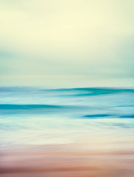 Retro Ocean Waves An abstract seascape with blurred panning motion and long exposure.  Image displays a retro, vintage look with cross-processed colors. seascape stock pictures, royalty-free photos & images