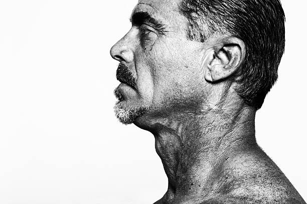 Man portrait with tattoos and mustaches against white background. Man portrait with tattoos and mustache against white background. Profile. Bad ass, urban life. toughness photos stock pictures, royalty-free photos & images