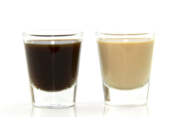 istock Espresso and milk coffee in shot glass 466475474